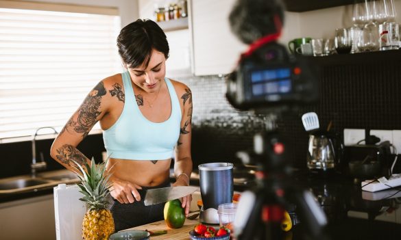 Woman creating a vlog about healthy eating